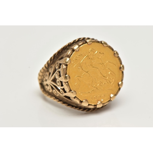 14 - A HALF SOVEREIGN RING, half sovereign dated 1898, claw set in a yellow gold mount, openwork scrollin... 