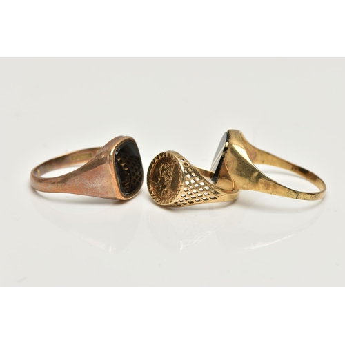 22 - THREE SIGNET RINGS, to include a polished onyx inlay signet ring, collet set in a yellow metal mount... 