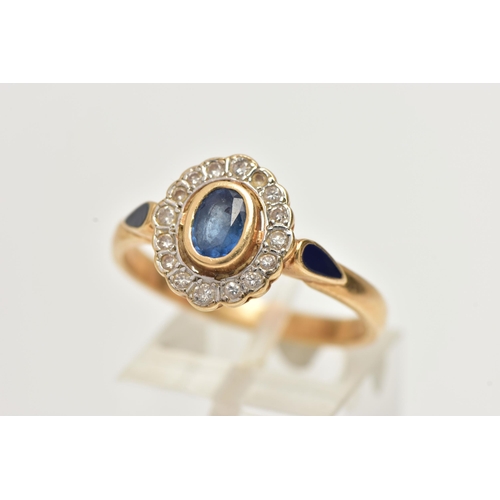 23 - A 14CT GOLD, SAPPHIRE AND DIAMOND CLUSTER RING, of an oval form, centrally set with an oval cut mid ... 