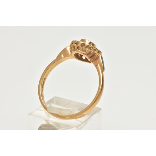 23 - A 14CT GOLD, SAPPHIRE AND DIAMOND CLUSTER RING, of an oval form, centrally set with an oval cut mid ... 