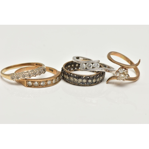 27 - FIVE ASSORTED RINGS, the first a 9ct yellow gold ring, set with a floral cluster of circular cut cub... 