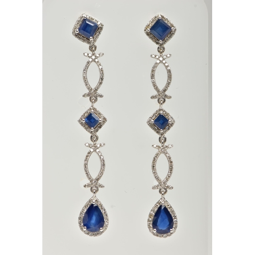 34 - A PAIR OF DIAMOND AND SAPPHIRE DROP EARRINGS, long drops set with two square cut mid blue sapphires ... 