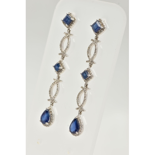 34 - A PAIR OF DIAMOND AND SAPPHIRE DROP EARRINGS, long drops set with two square cut mid blue sapphires ... 