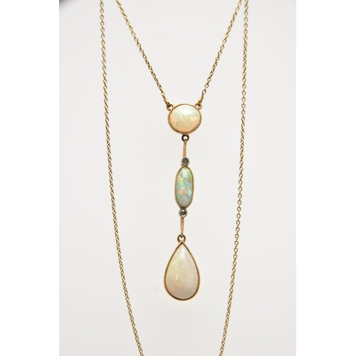 37 - AN OPAL AND DIAMOND PENDANT NECKLACE, the drop pendant set with two oval opal cabochons and a pear c... 