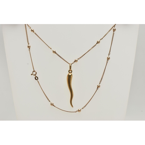 4 - A 9CT GOLD ITALIAN HORN PENDANT AND CHAIN, polished yellow gold Italian horn pendant, fitted with an... 