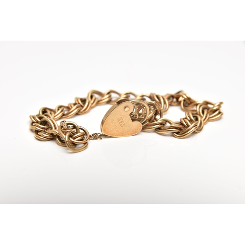 45 - A 9CT GOLD BRACELET, double oval link bracelet fitted with a heart padlock clasp, hallmarked 9ct Lon... 