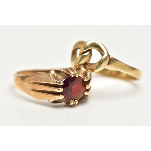 50 - TWO 9CT GOLD RINGS, the first designed with a claw set, circular cut garnet to a polished band, hall... 