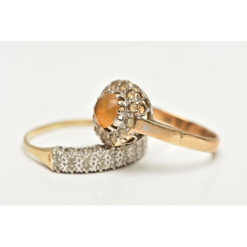 52 - TWO GEM SET RINGS, the first a cluster ring set with a central, circular cut orange stone in a surro... 