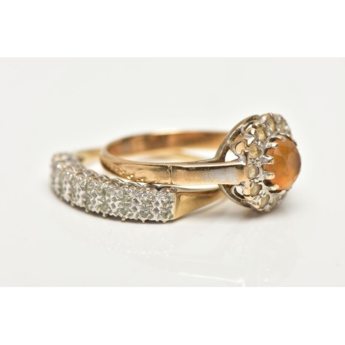 52 - TWO GEM SET RINGS, the first a cluster ring set with a central, circular cut orange stone in a surro... 