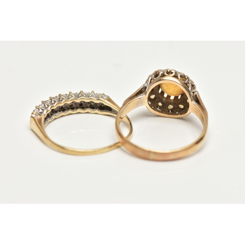 52 - TWO GEM SET RINGS, the first a cluster ring set with a central, circular cut orange stone in a surro... 