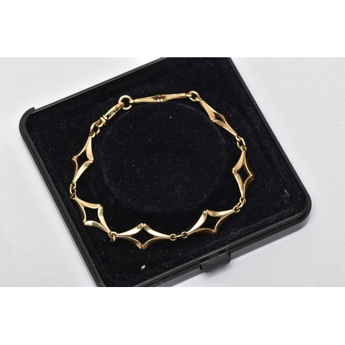 56 - A 9CT GOLD FANCY LINK BRACELET, designed with a series of openwork diamond shape links, with jump ri... 