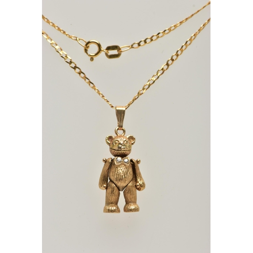 6 - A 9CT GOLD ARTICULATED TEDDY BEAR PENDANT AND CHAIN, realistically textured, articulated teddy bear ... 