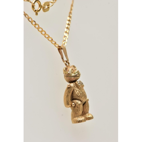 6 - A 9CT GOLD ARTICULATED TEDDY BEAR PENDANT AND CHAIN, realistically textured, articulated teddy bear ... 