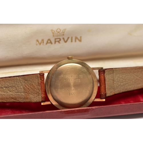 69 - A 9CT GOLD 'MARVIN' WRISTWATCH, hand wound movement, round dial signed 'Marvin', baton markers, subs... 