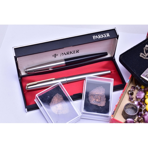 87 - A BOX OF ASSORTED ITEMS, to include two 'Parker' fountain pens, one fitted with a 14k nib, with a si... 