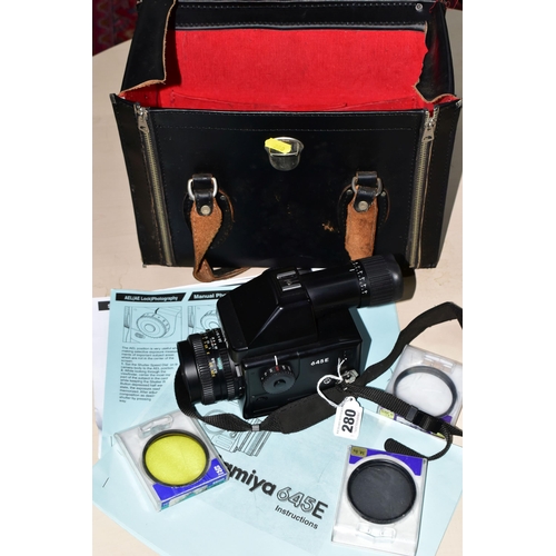 280 - A MAMIYA M645E MEDIUM FORMAT CAMERA fitted with a Secor C 80mm f2.8 lens, three filters and a case C... 