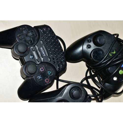 291 - BOX CONTAINING ORIGINAL XBOX AND PS3 CONTROLLERS, PS3 controllers are all equipped with a keyboard a... 