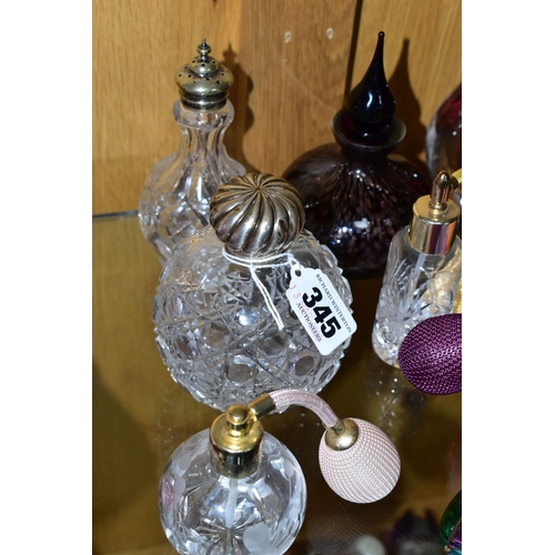 345 - A COLLECTION OF GLASS PAPERWEIGHTS AND SCENT BOTTLES, to include two signed Mdina paperweights, an A... 