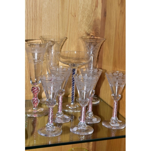 346 - A COLLECTION OF 20TH CENTURY DRINKING GLASSES WITH COLOURED GLASS STEMS, comprising a set of five wi... 