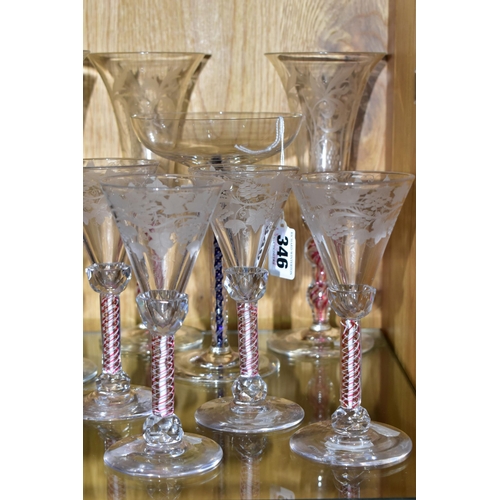 346 - A COLLECTION OF 20TH CENTURY DRINKING GLASSES WITH COLOURED GLASS STEMS, comprising a set of five wi... 