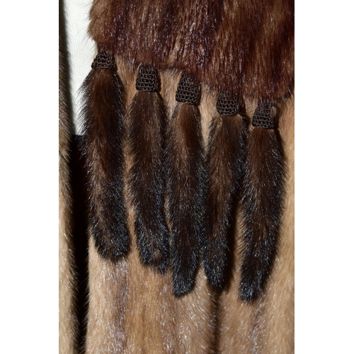 351 - A GROUP OF VINTAGE FUR COATS AND FUR STOLES, comprising a caramel coloured mid length coat, a large ... 