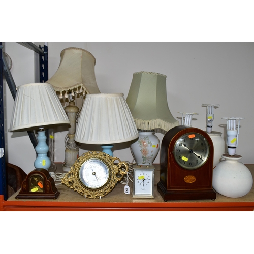 352 - GROUP OF TABLE LAMPS AND MANTEL CLOCKS, comprising three repainted cream table lamps, a mahogany man... 