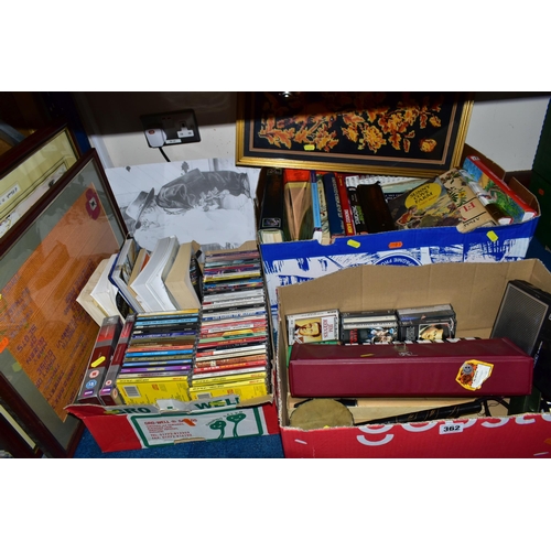 362 - THREE BOXES OF BOOKS, FRAMED PRINTS AND CDS, to include a Hohner Melodia piano 27, a Hohner Echo har... 