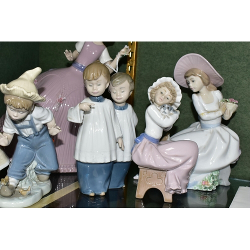 374 - A GROUP OF LLADRO AND NAO FIGURES, to include a Lladro Girl in Pink Dress model no 5120, sculptor Jo... 