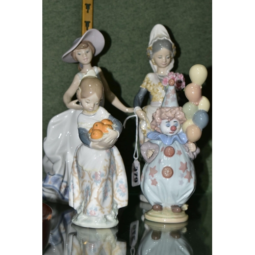 379 - FIVE LLADRO FIGURES, comprising Valencian Girl With Flowers no 1304, sculptor Juan Huerta, issued 19... 