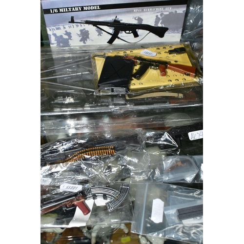 384 - A COLLECTION OF MINIATURE MODEL GUNS, depicting historic and more modern firearms, in various scales... 