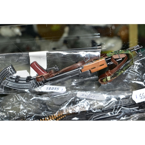 384 - A COLLECTION OF MINIATURE MODEL GUNS, depicting historic and more modern firearms, in various scales... 