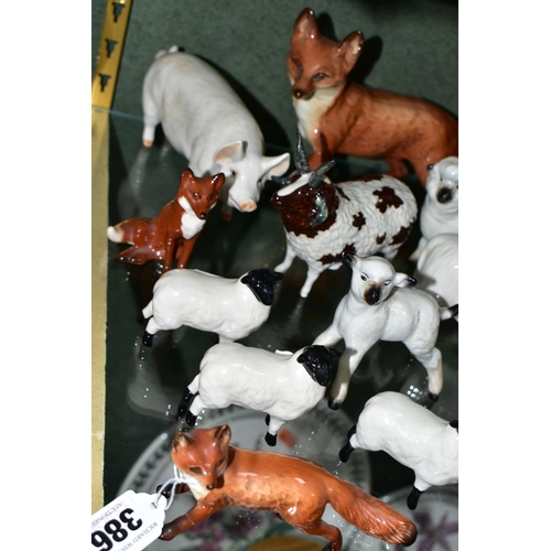 386 - A GROUP OF BESWICK FARM ANIMALS AND FOXES, comprising a Fox - Standing model no 1016A (one leg and t... 