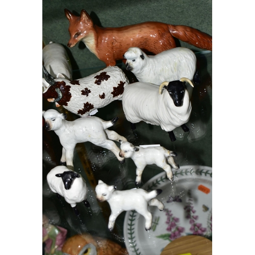 386 - A GROUP OF BESWICK FARM ANIMALS AND FOXES, comprising a Fox - Standing model no 1016A (one leg and t... 