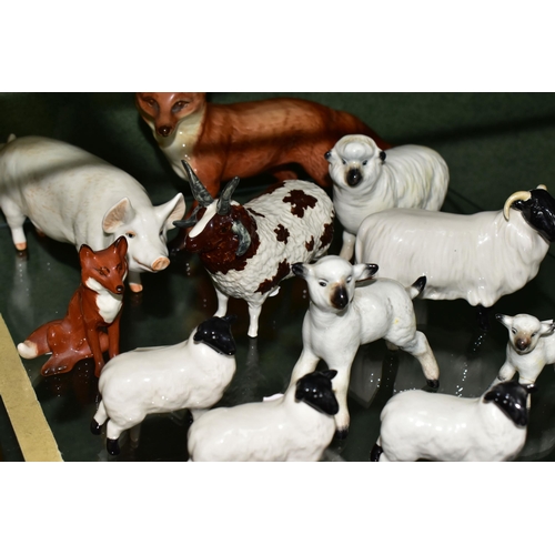 386 - A GROUP OF BESWICK FARM ANIMALS AND FOXES, comprising a Fox - Standing model no 1016A (one leg and t... 