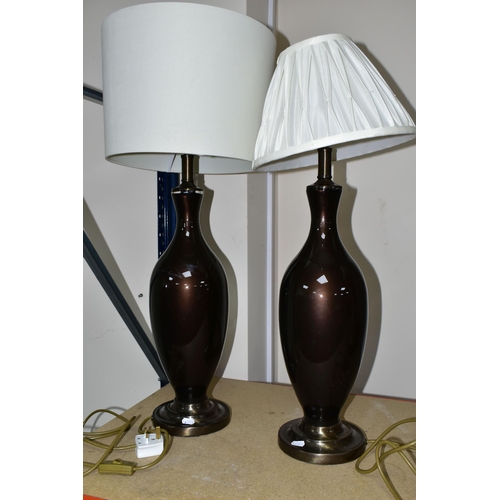 394 - A GROUP OF TABLE LAMPS, comprising a pair of modern metallic brown table lamp bases with mismatched ... 