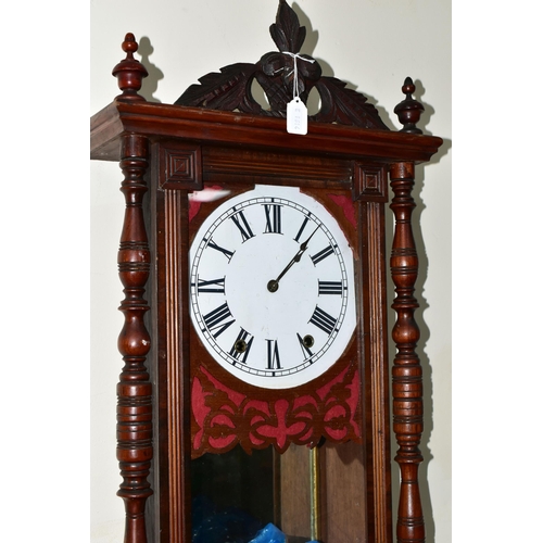 390 - A WALL CLOCK AND A BAROMETER, comprising a large wooden cased wall clock, back bears partial Jerome ... 