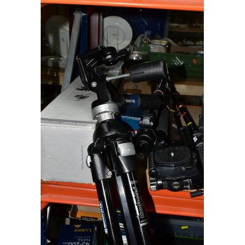 424 - A GROUP OF TRIPODS, comprising a boxed Manfrotto 055PROB tripod with a boxed Manfrotto geared head 1... 