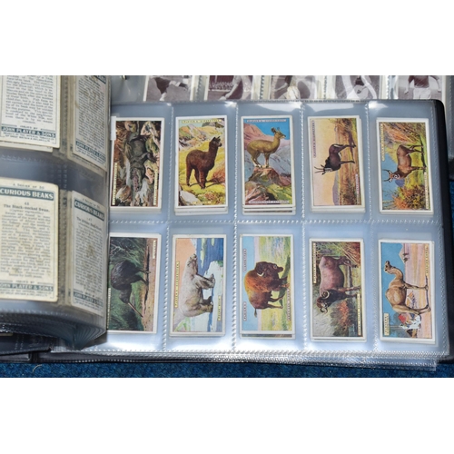 427 - CIGARETTE CARDS, Three Albums comprising nineteen complete sets of cards and one incomplete set (Wil... 