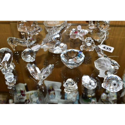 435 - A COLLECTION OF CRYSTAL ORNAMENTS, approximately sixteen pieces to include a Swarovski blow fish (fi... 