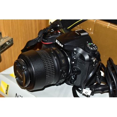 439 - A BOXED D7100 DIGITAL SLR CAMERA with two batteries, charger, a boxed Nikkor AF-SDX 18-55mm f3.5 VR ... 