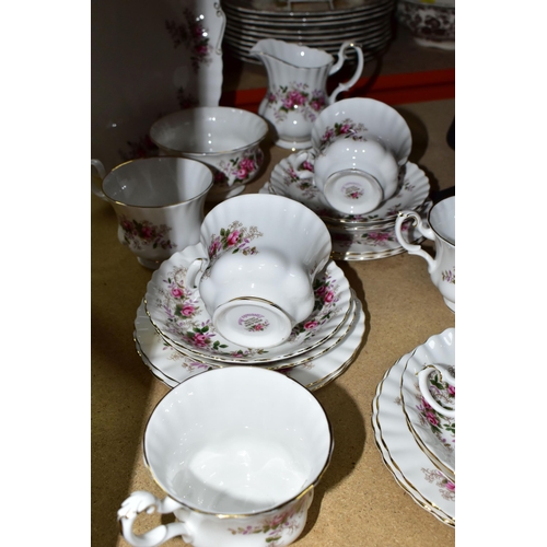 463 - A TWENTY ONE PIECE ROYAL ALBERT LAVENDER ROSE TEA SET, comprising a cake plate, a cream jug, a sugar... 