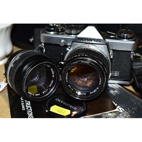 464 - AN OLYMPUS OM-1N FILM SLR CAMERA  with manual fitted with a Zuiko Auto-S 50mm f1.4 lens, an Auto-S 5... 