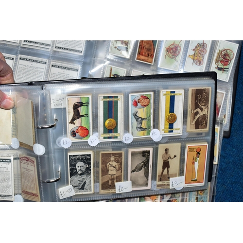 471 - CIGARETTE CARDS, three albums containing over 800 Cigarette Cards, in part sets and high value 'odds... 