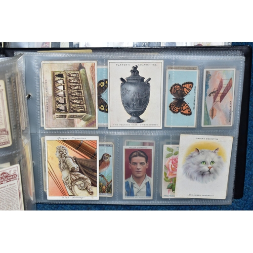 471 - CIGARETTE CARDS, three albums containing over 800 Cigarette Cards, in part sets and high value 'odds... 