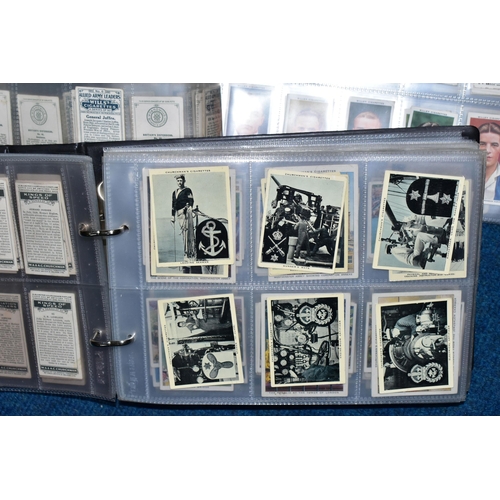 471 - CIGARETTE CARDS, three albums containing over 800 Cigarette Cards, in part sets and high value 'odds... 