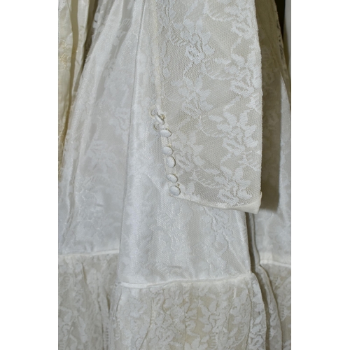 483 - A VINTAGE WEDDING DRESS AND A SILK CHRISTENING GOWN, comprising a handmade cream silk christening go... 