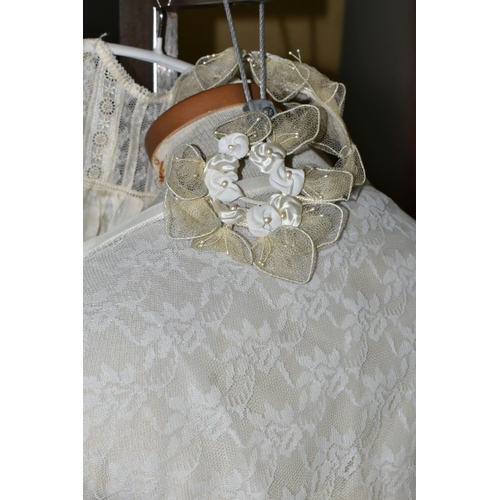 483 - A VINTAGE WEDDING DRESS AND A SILK CHRISTENING GOWN, comprising a handmade cream silk christening go... 