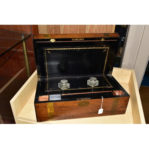 487 - A MAHOGANY VICTORIAN WRITING SLOPE, with brass banding, with an internal black leather writing slope... 