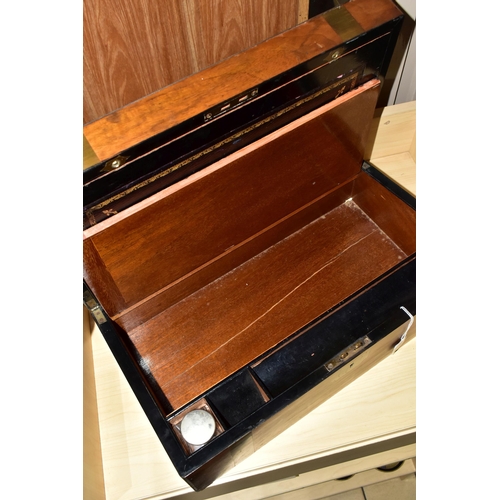 487 - A MAHOGANY VICTORIAN WRITING SLOPE, with brass banding, with an internal black leather writing slope... 