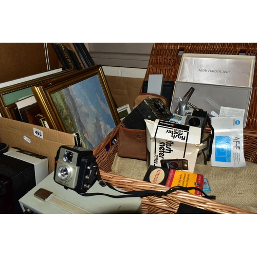 493 - ONE BOX OF FRAMED PRINTS, VINTAGE MOVIE CAMERAS AND PROJECTORS, to include a large gilt framed water... 